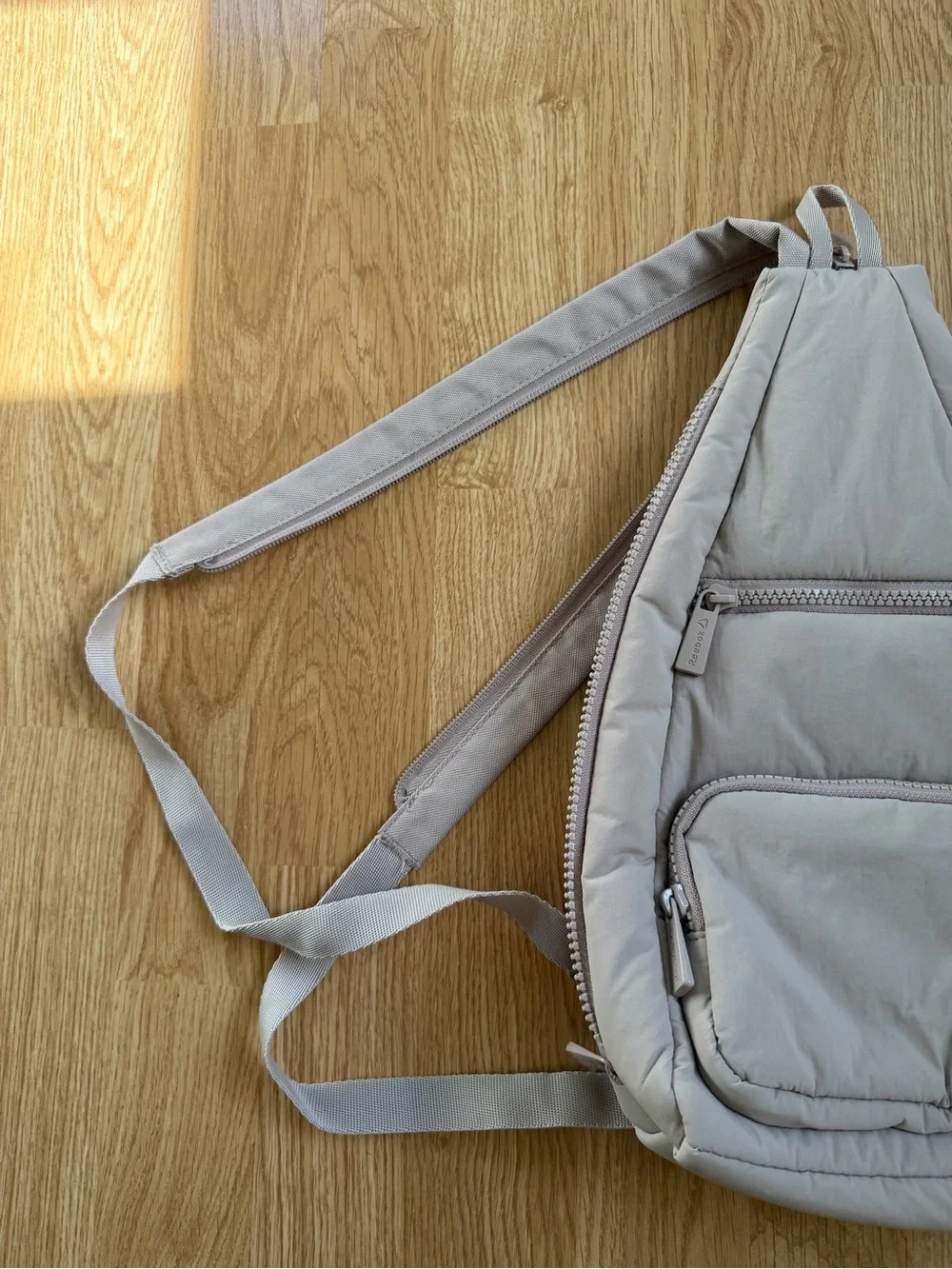 Reebok Women’s Maeve Pale Pink Convertible Crossbody Sling Backpack (Mocha)